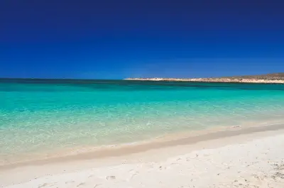 Clear turquoise water and white sand at Turquoise Bay in Cape Range National Park.