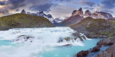 Salto Grande waterfall with Cuernos del Paine mountains in Patagonia Chile.