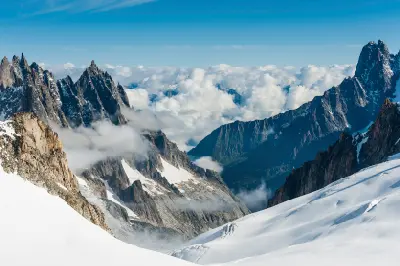 Wide view of the Vallée Blanche glacier basin with jagged alpine peaks in the Mont Blanc massif above Chamonix.