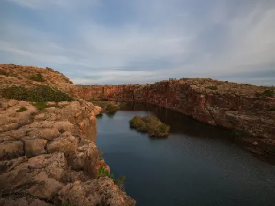 Yardie Creek winds between rugged red limestone cliffs in Cape Range National Park.