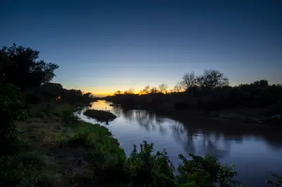 Sunrise reflected on the Luvuvhu River near Crooks Corner in northern Kruger National Park.