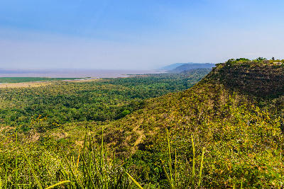 View over the Groundwater Forest, Great Rift Valley escarpment and Lake Manyara in Lake Manyara National Park, Tanzania.