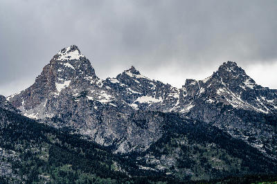 View of the Teton Range in cloudy conditions from Teton Glacier Turnout, Grand Teton National Park, Wyoming, USA.