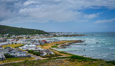 Panoramic coastal view of L’Agulhas and the shoreline of Cape Agulhas at the southernmost tip of Africa, South Africa.