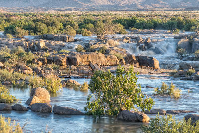 Boardwalk leading to Augrabies Falls with the Orange River in flood, Augrabies National Park, Northern Cape, South Africa.