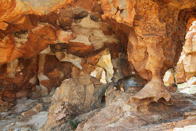 Intricately sculpted sandstone chambers and weathered rock formations inside Stadsaal Caves in the Cederberg Wilderness Area, Western Cape, South Africa.