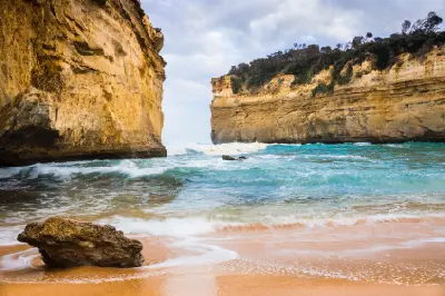 Beach and limestone cliffs at Gibson Steps near the Twelve Apostles, Victoria, Australia.