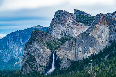 Lower Yosemite Falls cascading down granite cliffs in Yosemite Valley, Yosemite National Park, California.
