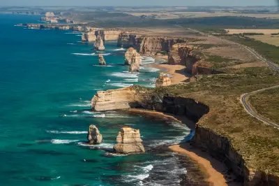 Aerial view of the Twelve Apostles, coastal cliffs and Great Ocean Road in Victoria, Australia.