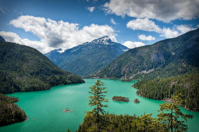 Diablo Lake North Cascades Washington turquoise glacial lake surrounded by forested mountains and alpine peaks