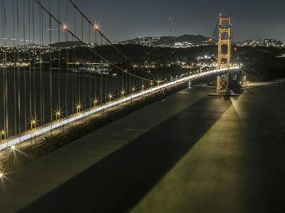 Golden Gate Bridge at night from Hawk Hill with long exposure light trails