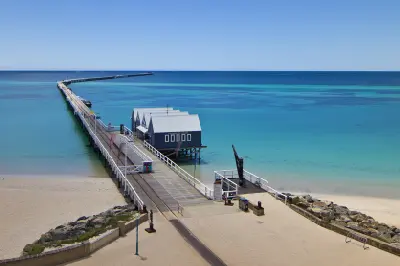 Busselton Jetty extending nearly two kilometres into Geographe Bay, Western Australia.