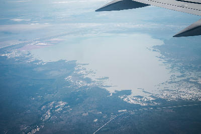 Aerial view of the Makgadikgadi Pans showing expansive white salt flats in Botswana.