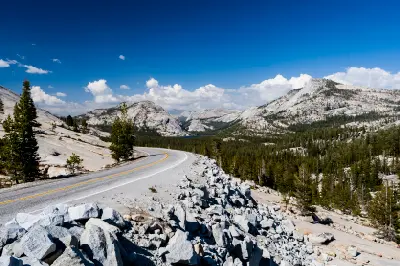 Tioga Road winding through Sierra Nevada granite landscape Yosemite