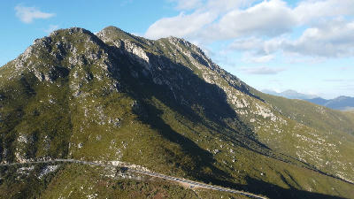 Aerial view of Robinson Pass below steep mountain slopes in the Outeniqua Mountains of the Western Cape, South Africa.