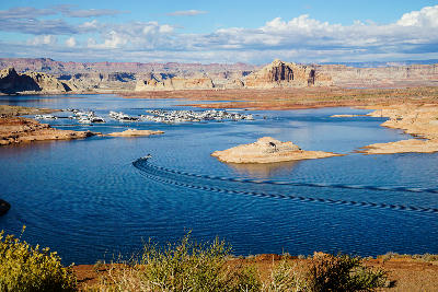Lake Powell marina boats wide reservoir sandstone mesas Glen Canyon Arizona Utah