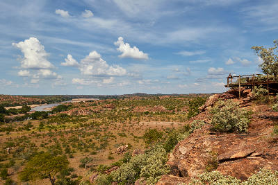 View across the sandstone wilderness of Mapungubwe National Park with the Limpopo River winding through the valley below.