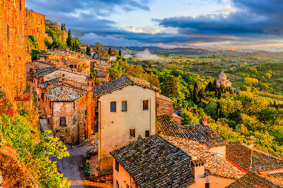 View from Montepulciano across the surrounding Tuscan countryside, with rolling hills and farmland in southern Tuscany, Italy.