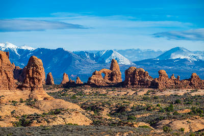 Turret Arch and surrounding sandstone formations with snow-capped La Sal Mountains in the background, Arches National Park Utah