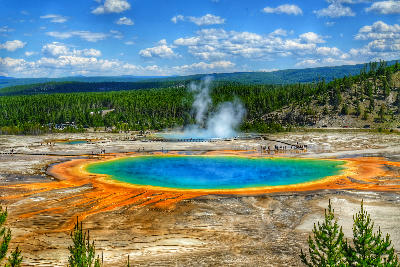 Grand Prismatic Spring Yellowstone showing colorful geothermal hot spring with boardwalk and steam