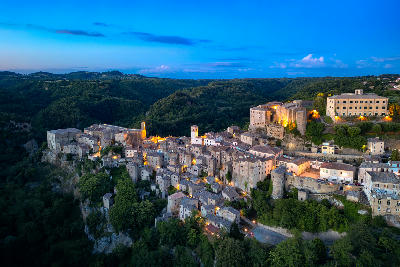 Hilltop town of Sorano at dusk in the Maremma region of Tuscany, Italy.
