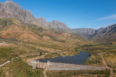 Aerial view of the reservoir and rugged mountain landscape in Jonkershoek Nature Reserve near Stellenbosch, Cape Winelands, South Africa.