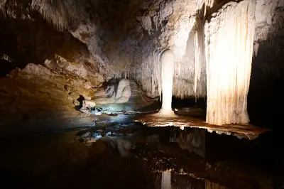 Suspended Table limestone formation reflected in the underground water of Lake Cave, Western Australia.