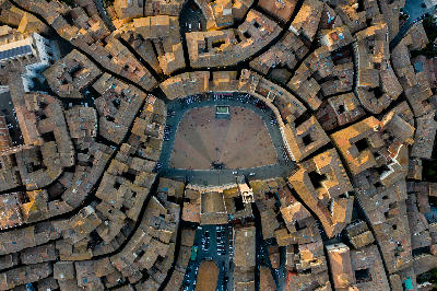 Aerial view of Piazza del Campo, the shell-shaped medieval square in Siena, Tuscany.