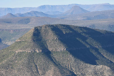 Layered Karoo mountains and dolerite-capped hills in Camdeboo National Park near Graaff-Reinet, Eastern Cape, South Africa.