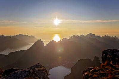 Grytetippen Senja Norway midnight sun mountain ridge view over fjords and coastal peaks