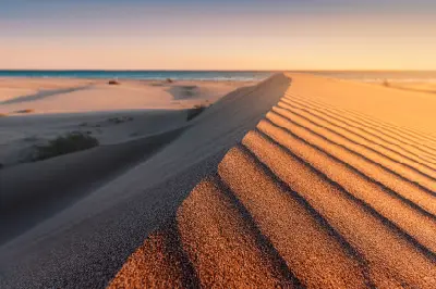 https://chatgpt.com/c/6a710802-7cfc-83ea-b629-4365bd965a85#:~:text=Close%2Dup%20of%20wind%2Dsculpted%20sand%20dunes%20at%20Patara%20Beach%2C%20with%20rippled%20orange%2Dgold%20sand%20leading%20toward%20the%20Mediterranean%20Sea%20beneath%20a%20soft%20sunset%20sky.