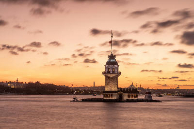 Maiden’s Tower (Kız Kulesi) photographed during blue hour on a small islet at the southern entrance of the Bosphorus in Istanbul, Turkey.