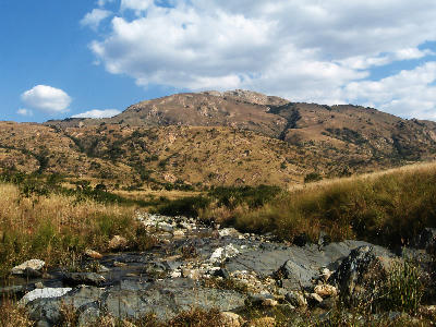 Rocky stream flowing through the Makhonjwa Mountains near Barberton, Mpumalanga, South Africa.