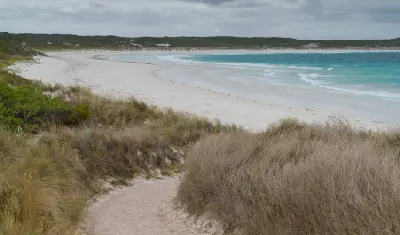 Sandy path through coastal vegetation leading to Twilight Beach near Esperance, Western Australia.