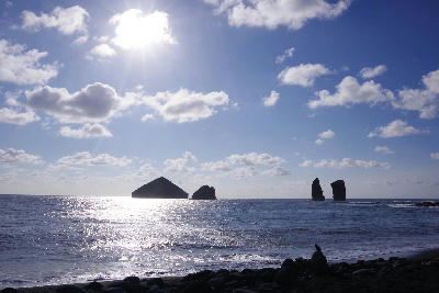 Mosteiros Beach with volcanic black sand and the Ilhéus dos Mosteiros sea stacks off the coast of São Miguel in the Azores.