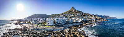 Aerial view of Sea Point and the Atlantic coastline with Lion’s Head rising above Cape Town, South Africa.