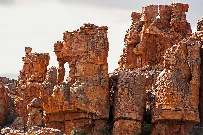 Sandstone towers, natural arches, and weathered rock formations at Truitjieskraal in the Cederberg Wilderness Area, Western Cape, South Africa.