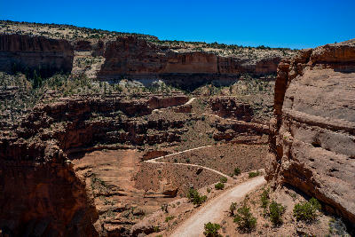 Shafer Trail winding through steep canyon walls below Shafer Canyon Overlook in Canyonlands National Park Utah