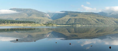 Reflection of the Langeberg Mountains in Bufflejags Dam near Swellendam in the Western Cape, South Africa.