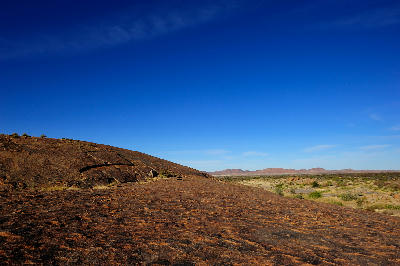 Granite dome of Moon Rock overlooking the arid landscape of Augrabies Falls National Park, South Africa.