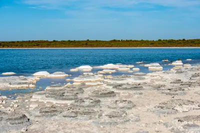 Thrombolite formations line the shallow blue waters of Lake Thetis near Cervantes.