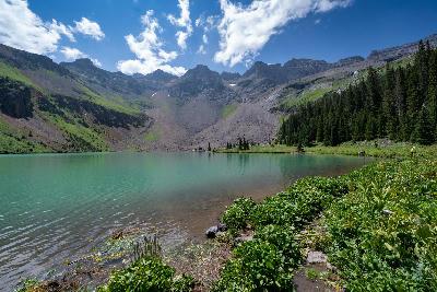 Lower Blue Lake with clear water and alpine mountains, San Juan Mountains, Colorado.