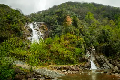 Wide view of Ağaran Waterfall cascading through a forested valley near Çayeli, Rize, Turkey.