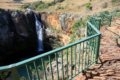 Viewing platform and safety railing at Berlin Falls overlooking the waterfall and plunge pool on the Panorama Route in Mpumalanga, South Africa.