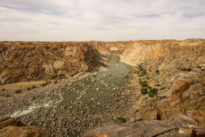 View from Ararat Viewpoint across the Orange River Gorge and granite canyon landscapes in Augrabies Falls National Park, South Africa.