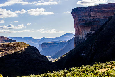 Side view of Brandwag Buttress overlooking a deep valley in Golden Gate Highlands National Park, Free State, South Africa.