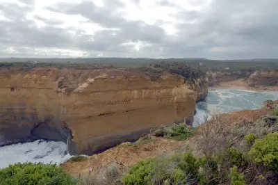 Elevated view of limestone cliffs and the beach at Loch Ard Gorge, Victoria, Australia.