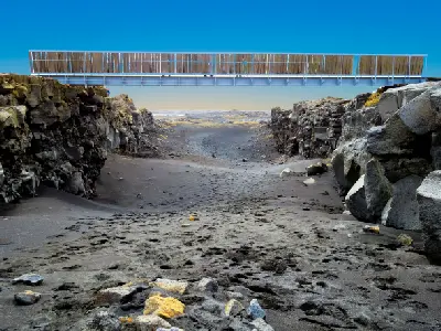 Footbridge crossing the Álfagjá rift at the Bridge Between Continents on the Reykjanes Peninsula, Iceland.