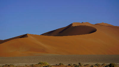 Big Daddy Dune towering above the red sand dunes of Sossusvlei in Namibia’s Namib Desert.