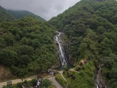 Aerial view of Ağaran Waterfall surrounded by dense forest near Çayeli, Rize, Turkey.